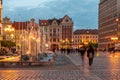 WrocÃâaw at dusk is a city on the Oder River in western Poland. ItÃ¢â¬â¢s known for its Market Square, elegant townhouses and